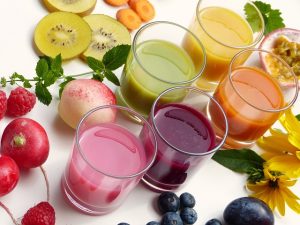 the difference colon cleanse makes - picture of various smoothies in glasses and different fruits